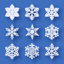 Vector Set Of 9 White Christmas Paper Cut Snowflakes With Shadow On Blue Background. New Year And Christmas Design Elements