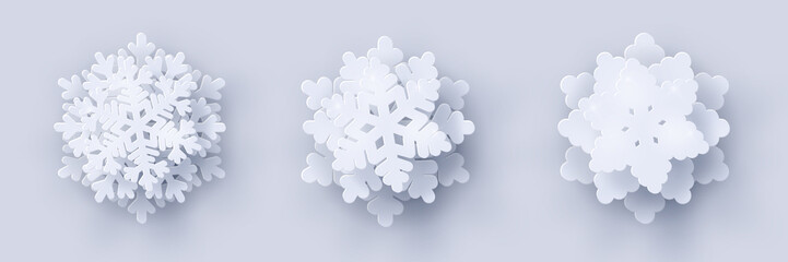 Wall Mural - vector set of 3 white christmas paper cut 3d snowflakes with shadow on white background. new year an