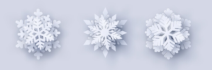 Wall Mural - vector set of 3 white christmas paper cut 3d snowflakes with shadow on white background. new year an