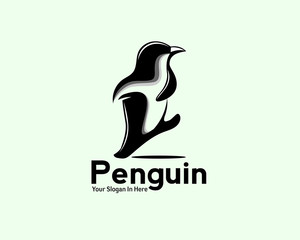 Canvas Print - walking fun penguin animal logo vector