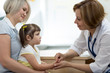 © Oksana Kuzmina - Mother and her little daughter at the pediatrician. Doctor consulting woman with child.