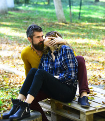 Wall Mural - Couple in love spends time in park. Autumn and love