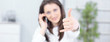 © yurolaitsalbert - successful business woman showing thumb up,sitting at your Desk