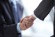 © yurolaitsalbert - close up.business handshake on blurred office background