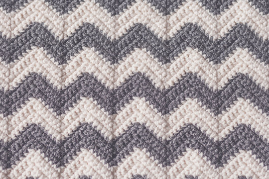 Gray and White Crochet Blanket in Chevron Stripe Pattern
