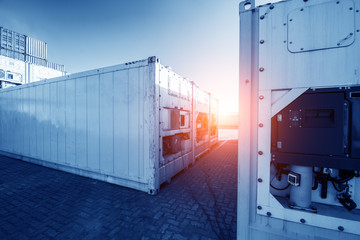 Stacked containers in a shipping terminal