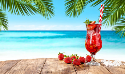 Summer drink on beach and free space for your decoration. 