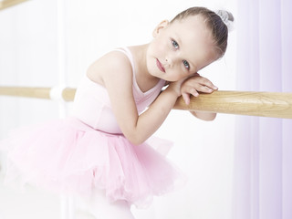 Close-up portrait of small girl in dance class