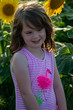 © Chris - Beauty joyful young girl with sunflower enjoying nature and laughing on summer sunflower field. Sunflare, sunbeams, glow sun. Backlit.
