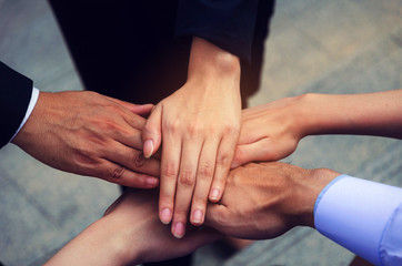 hand of group of business people team joining hands together in the modern city, team leader, successful, support, meeting, partner, teamwork, community, confident and connection concept