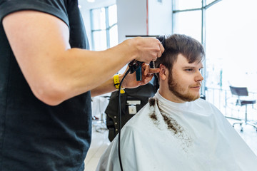 man at professional barbershop