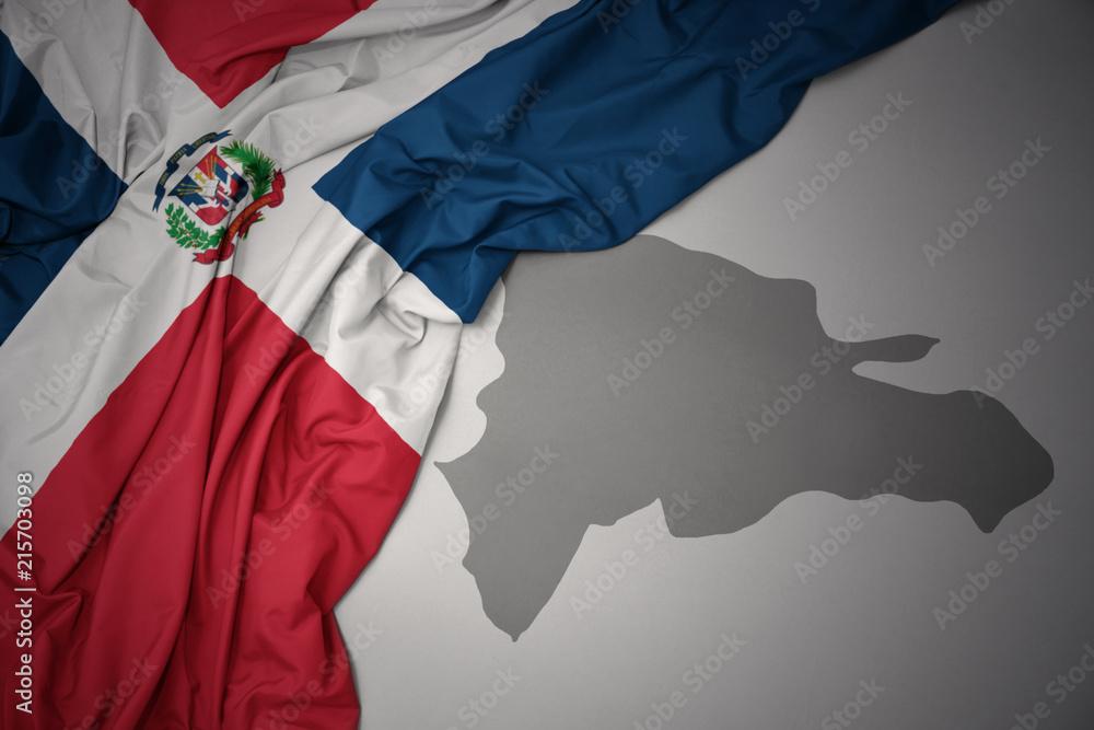 waving colorful national flag and map of dominican republic. - obrazy, fototapety, plakaty 