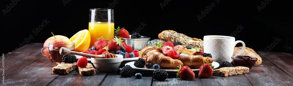 breakfast on table with waffles, croissants, coffe and juice. - obrazy, fototapety, plakaty 