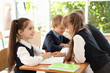 © New Africa - Little children in classroom. Stylish school uniform