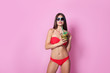 © New Africa - Sexy young woman in bikini with pineapple cocktail on color background
