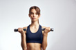 © SHOTPRIME STUDIO - young woman doing fitness exercises with dumbbells
