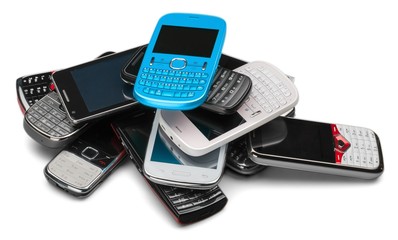 Sticker - Pile of old smartphones isolated on white background