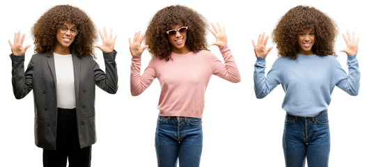 Sticker - African american young woman wearing different outfits showing and pointing up with fingers number ten while smiling confident and happy.