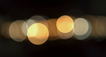Wall Mural - Lights bokeh on black background