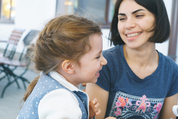 Sticker - Mother Looking at Laughing Girl