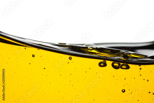 Fotografía Pouring oil car motor or olive vegetable cooking and bubble isolated on white ba