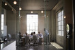 © Monkey Business - Business colleagues at a meeting in a glass walled boardroom