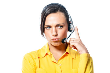 Sullen call centre operator listening to a call