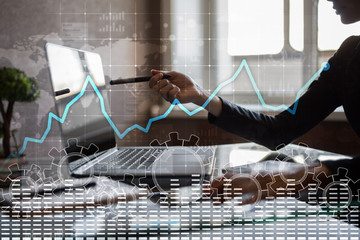 Data analysis graph on virtual screen. Business finance and technology concept.