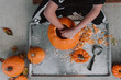 © Melanie DeFazio Photography/Stocksy - Pumpkin carving