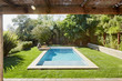 © Trinette Reed/Stocksy - Small pool in backyard of home in California
