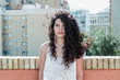 © Vera Lair/Stocksy - Portrait of a curly hair woman