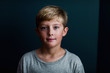 © Kelly Knox/Stocksy - portrait of a confident preteen boy