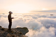 © guille Faingold/Stocksy - Amazing view of man in vr headset with remote controller on top