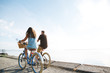 © Rob and Julia Campbell/Stocksy - Healthy, active couple enjoying life riding cruiser bikes near o