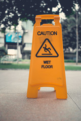 Yellow wet floor sign