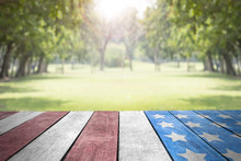 Independence Day 4th July, Labor Day, Veterans Day, Presidents Day, Patriot USA Flag On Table Top In The Park For Background