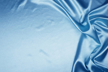 Blue luxury satin fabric texture for background