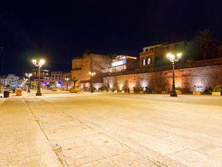 View of alghero at night. A beautiful city vibrant. Sardinia, Italy