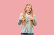 © master1305 - The happy business woman standing and smiling against pink background.