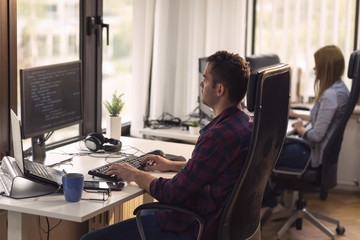 Programmers coding