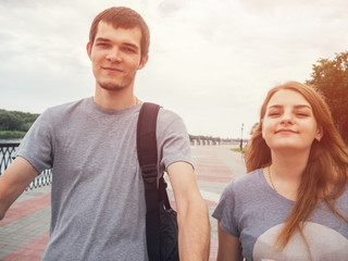 Young couple of traveling bloggers