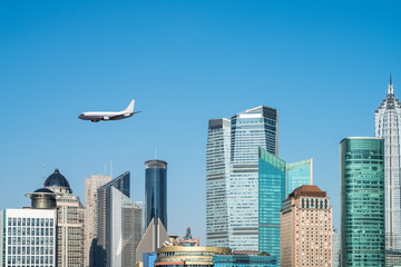 Wall Mural - modern buildings and airplane