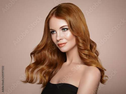 Redhead Girl With Long Healthy And Shiny Curly Hair Care
