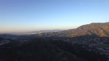 Aerial View Peeking Through A Hill In The Early Morning Overlooking The City Of Glendale, California