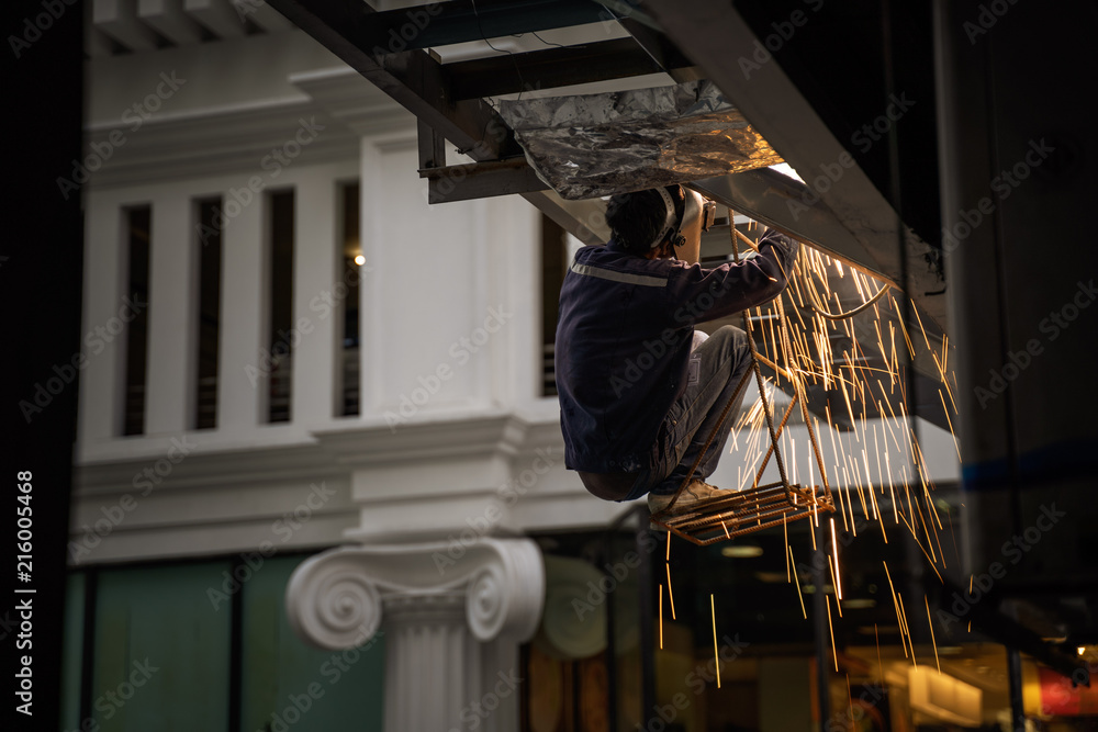 Engineer Steel Welding And Sit On Chair Hang On Building