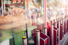 Claw machine in the amusement park of the mall which insert coin and press the control button to steel claw for pull up the doll, Skill crane or Teddy picker is game for play to fun.