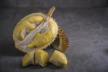 Wall Mural - close up shot on durian, sweet king of fruits on dark background,