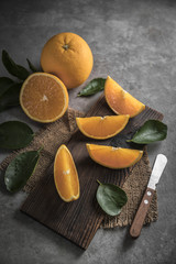 Wall Mural - Beautiful, fresh orange on the dark background. Healthy sweet food concept.