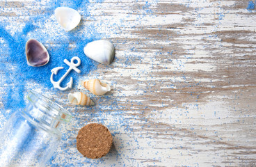 Wall Mural - Summer background,Blue sand and seashells on wooden background,top view