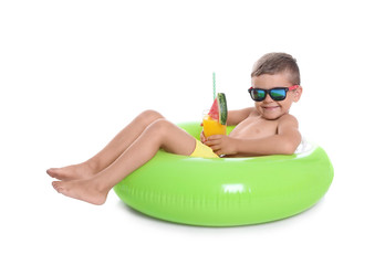 Poster - Cute little boy with inflatable ring and glass of cocktail on white background